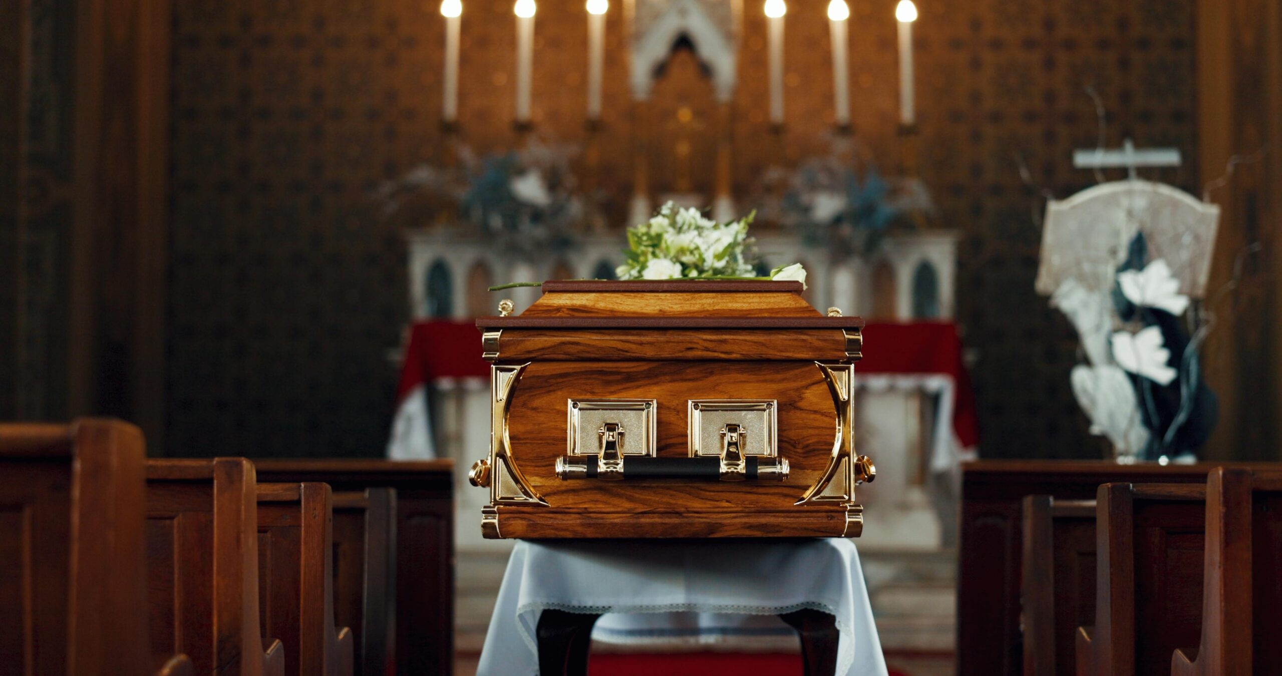 Coffin, church and funeral service in closeup, memorial and event to celebrate life, worship and fa.